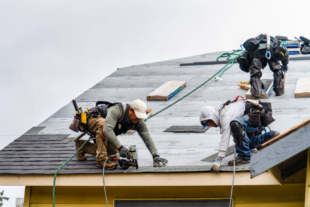 Professional Gutter Installation technician working in Fallentimber, PA